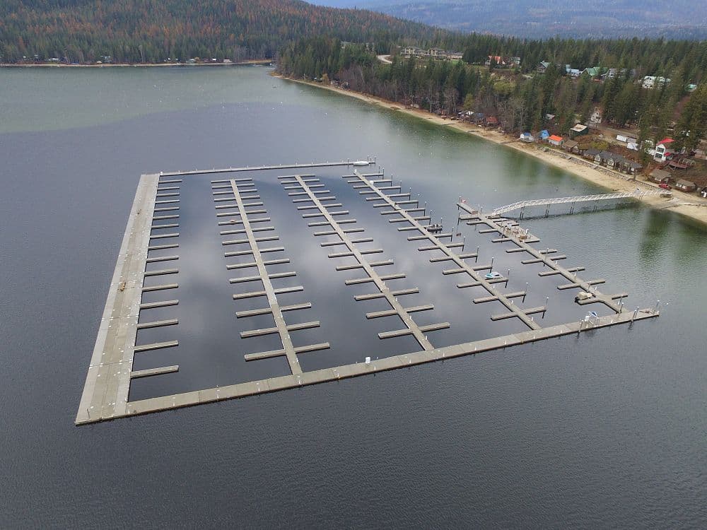 Aerial view of Mabel Lake Marina, BC, showing the full 260-slip concrete dock system and protective breakwater installed by Burton Marine.