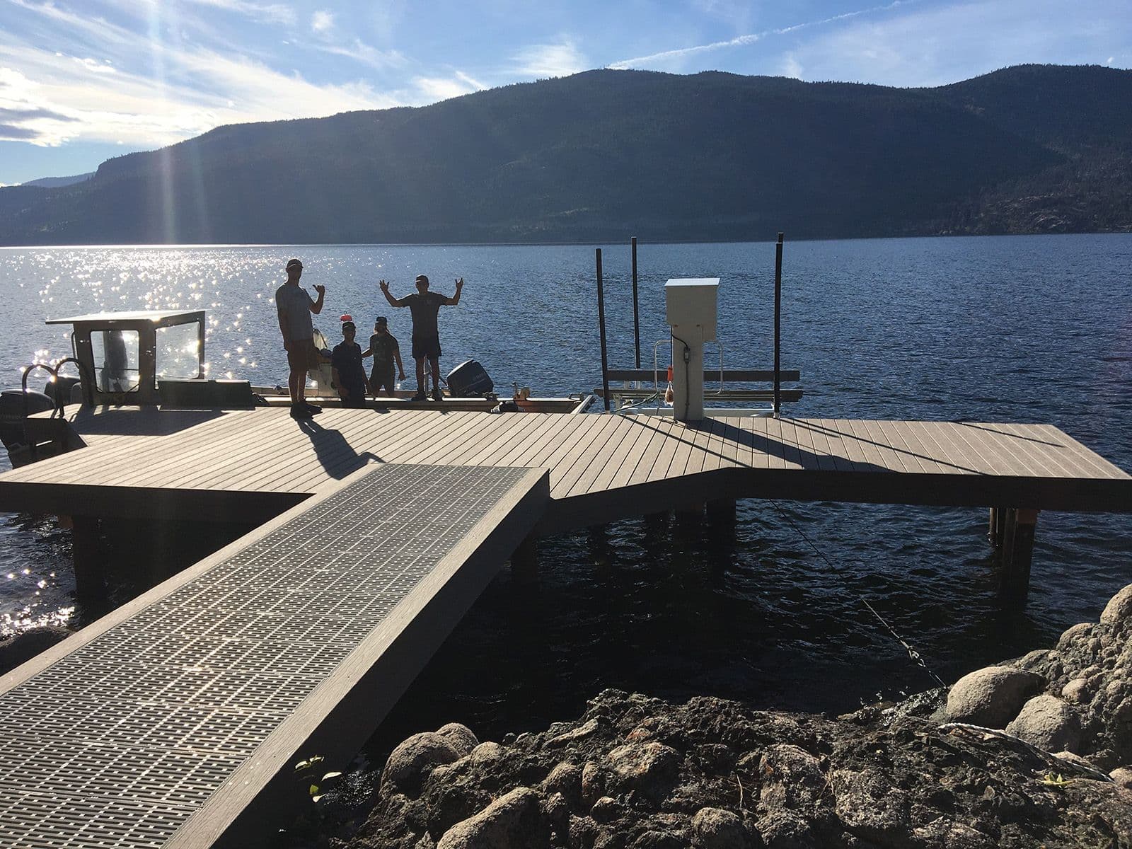 Fully restored dock with reinforced decking and upgraded ramp on Okanagan Lake, designed for safer access, moorage, and long-term durability.
